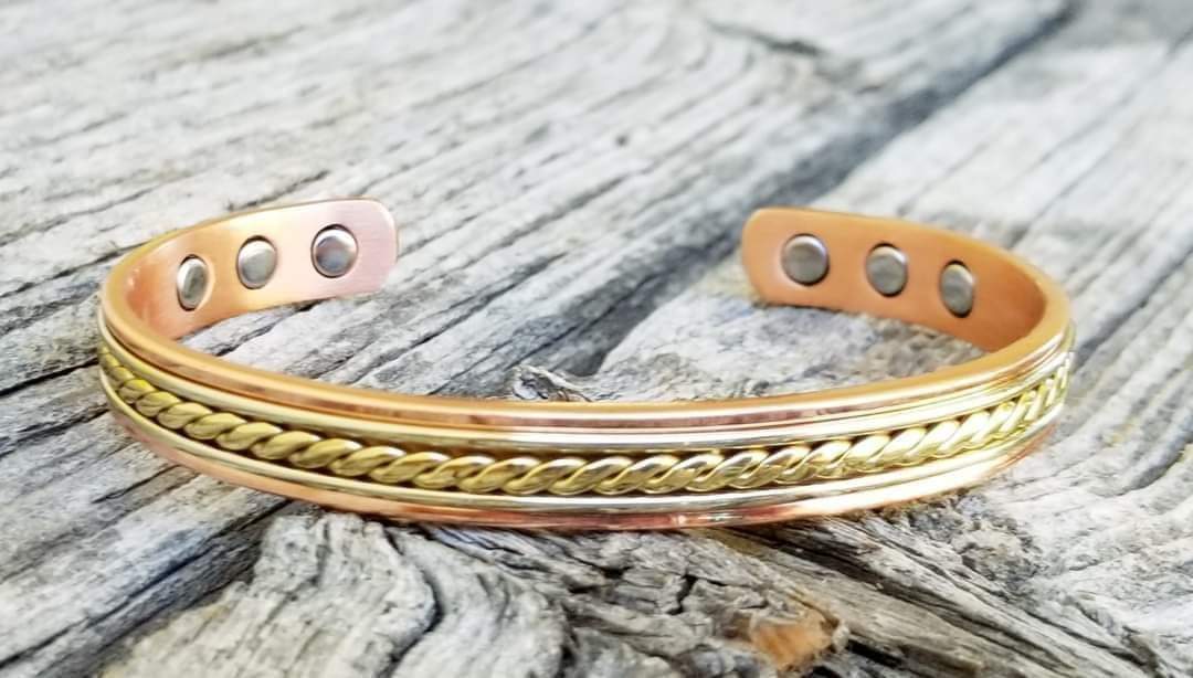 Copper cuff bracelet with magnets